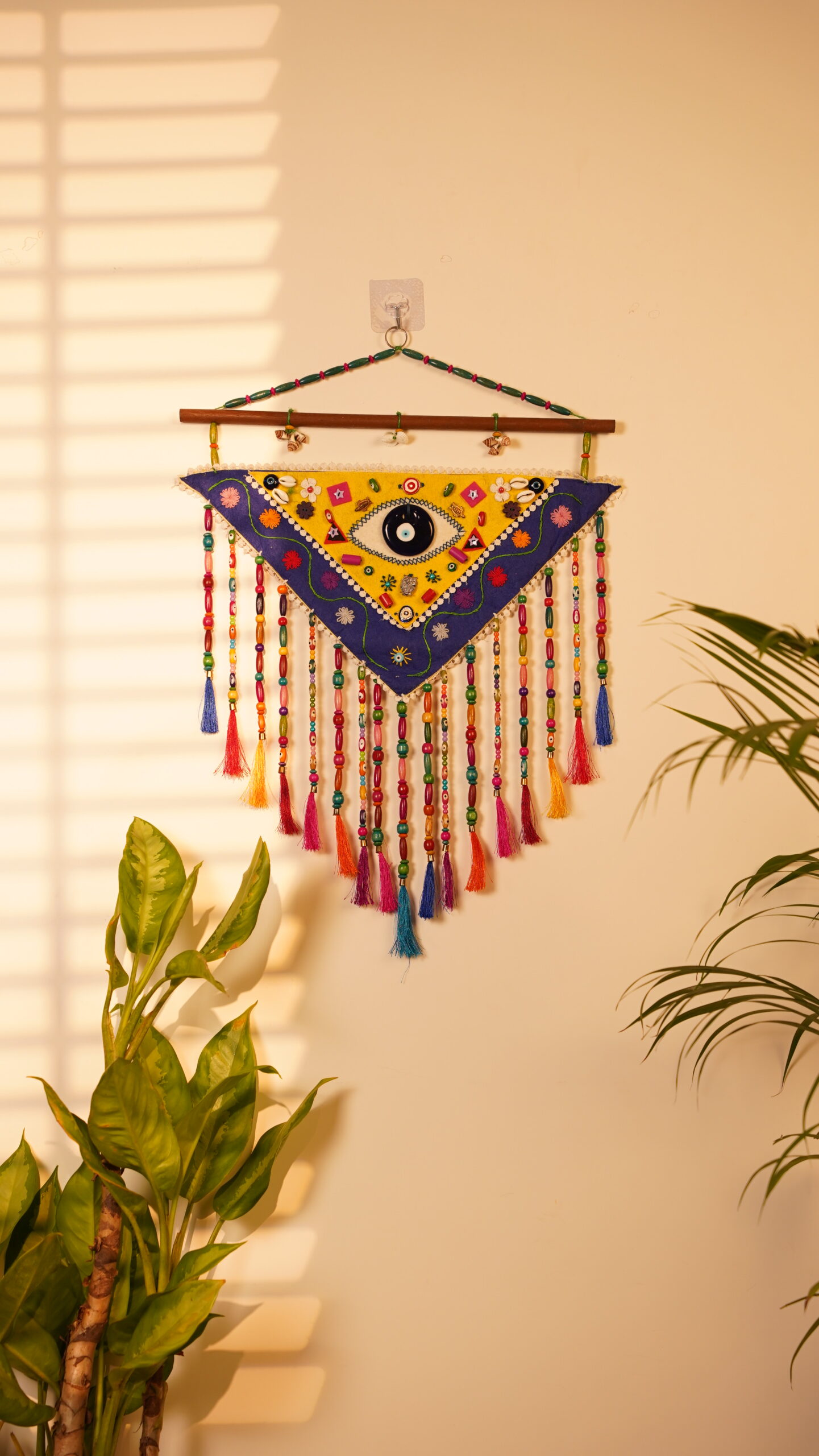 EVIL EYE TRIANGULAR WALL ART